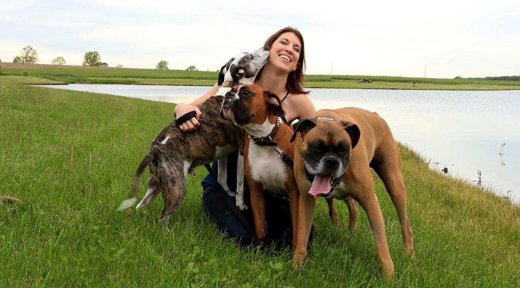 Timea H. Brady, DVM, and her dogs